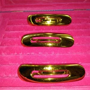 Sold ...solid gold metal hair barrettes  made in France